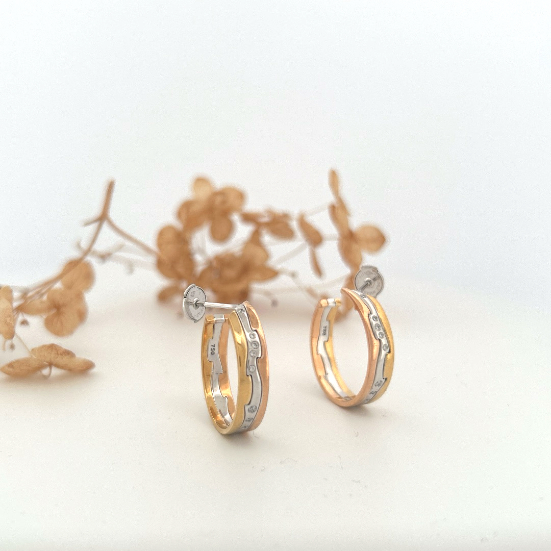 Vintage örhängen Georg Jensen Fusion 18k diamanter